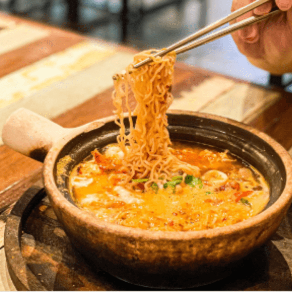 Tom Yum Noodles, fried egg and Prawns
